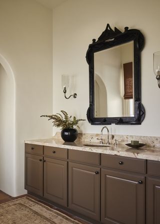 A bathroom with polished nickel features