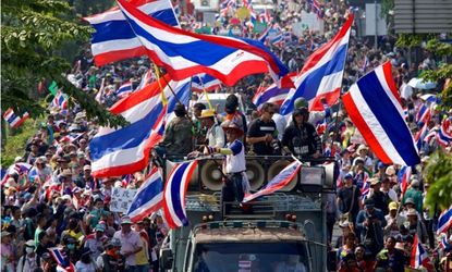 Anti-government protesters march through Bangkok on Jan. 19.