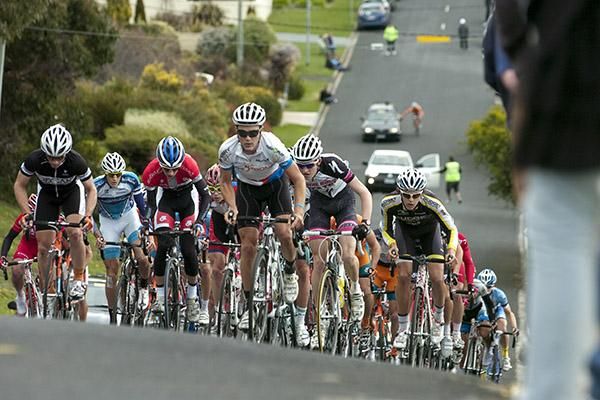 The peloton are out of the saddle on another leg-sapping climb during the tour.