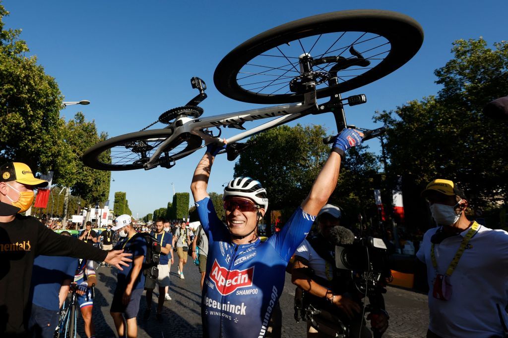 AlpecinDeceuninck teams Belgian rider Jasper Philipsen celebrates after winning the 21st and final stage of the 109th edition of the Tour de France cycling race 1156 km between La Defense Arena in Nanterre outside Paris and the ChampsElysees in Paris France on July 24 2022 Photo by GONZALO FUENTES POOL AFP Photo by GONZALO FUENTESPOOLAFP via Getty Images