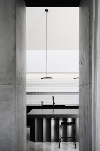 brutalist concrete kitchen at Colonnade House by Splinter Society
