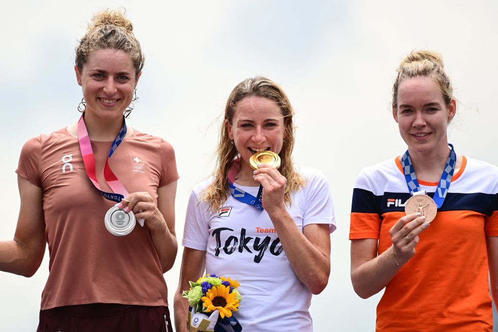 LR Silver medalist Switzerlands Marlen Reusser gold medalist Netherlands Annemiek Van Vleuten and bronze medalist Netherlands Anna Van Der Breggen celebrate on the podium of the womens cycling road individual time trial during the Tokyo 2020 Olympic Games at the Fuji International Speedway in Oyama Japan on July 28 2021 Photo by Ina FASSBENDER AFP Photo by INA FASSBENDERAFP via Getty Images