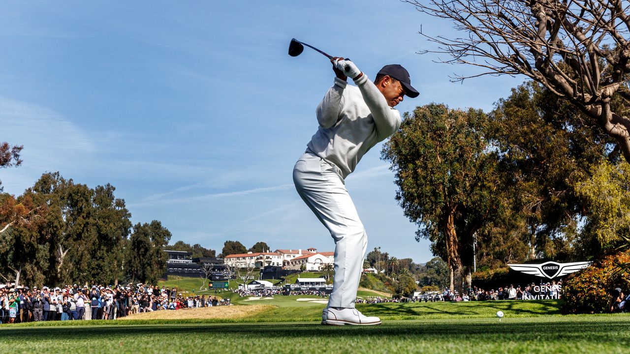 Tiger Woods plays a drive on the 9th at the Genesis Invitational at Riviera