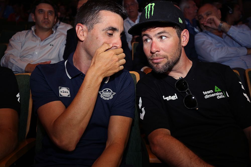 Max Richeze and Mark Cavendish share a secret at the Vuelta a San Juan press conference