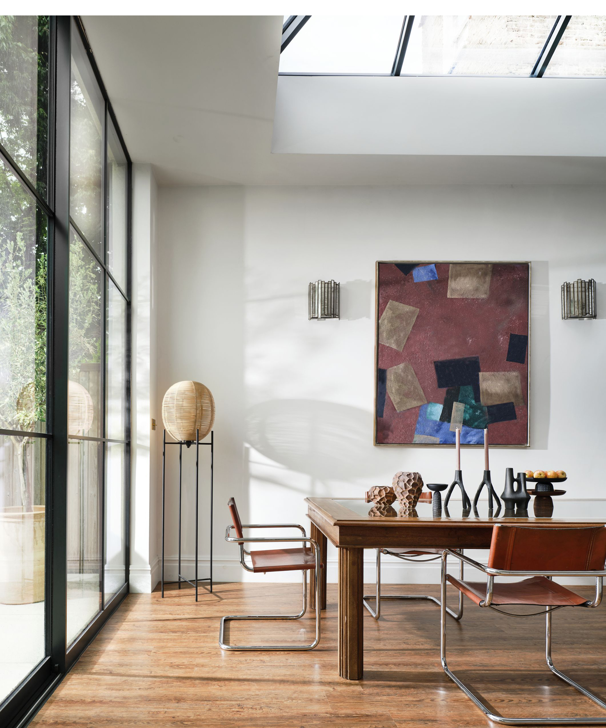 Dining room with engineered wooden floor, wooden table by the floor room