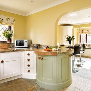 kitchen room with capacious drum cupboard and integral chopping board