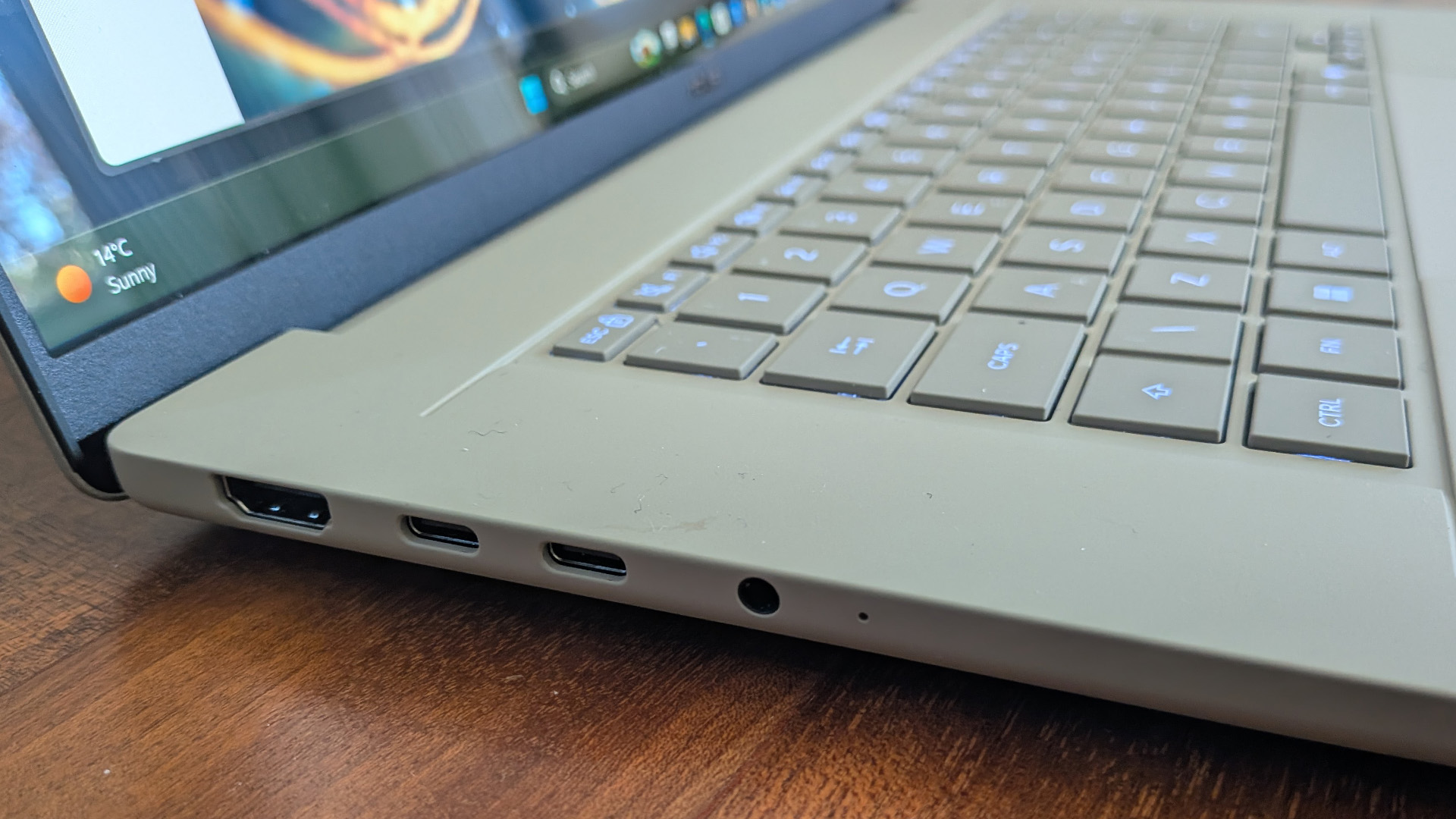 The Asus Zenbook A16 on a desk