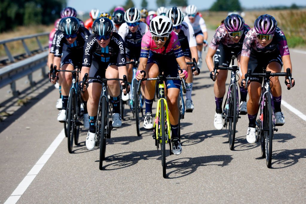 LELYSTAD NETHERLANDS AUGUST 30 LR Charlotte Kool of Netherlands and Team DSM Eleonora Camilla Gasparrini of Italy and Team Valcar Travel Service compete during the 25th Simac Ladies Tour 2022 Stage 1 a 1412km stage from Lelystad to Lelystad SLT2022 UCIWWT on August 30 2022 in Lelystad Netherlands Photo by Bas CzerwinskiGetty Images