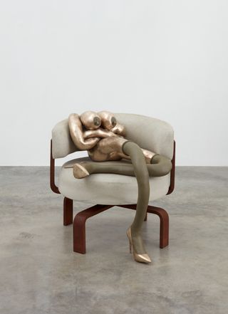 sculpture on chair