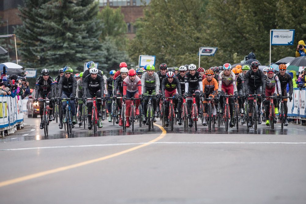 The peloton rides into the finish after being neutralized