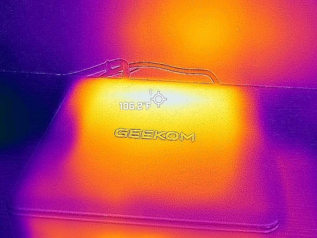 Pictures taken with a thermal camera of the Geekom IT13 top back area showing that it gets to 106 degrees F.