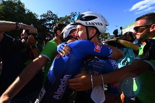Kaden Groves (Alpecin-Deceuninck) is congratulated by his teammate after winning stage 4