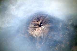 A view of smoke billowing across the skies of California on Aug. 29, 2021, captured by NASA astronaut Megan McArthur aboard the International Space Station.