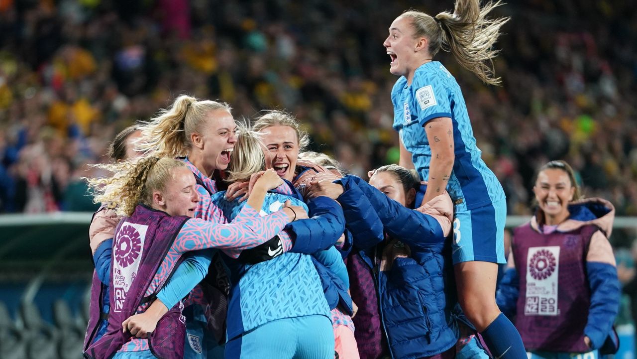 England women&amp;#039;s football team the Lionesses celebrating victory over Australia in semi-final