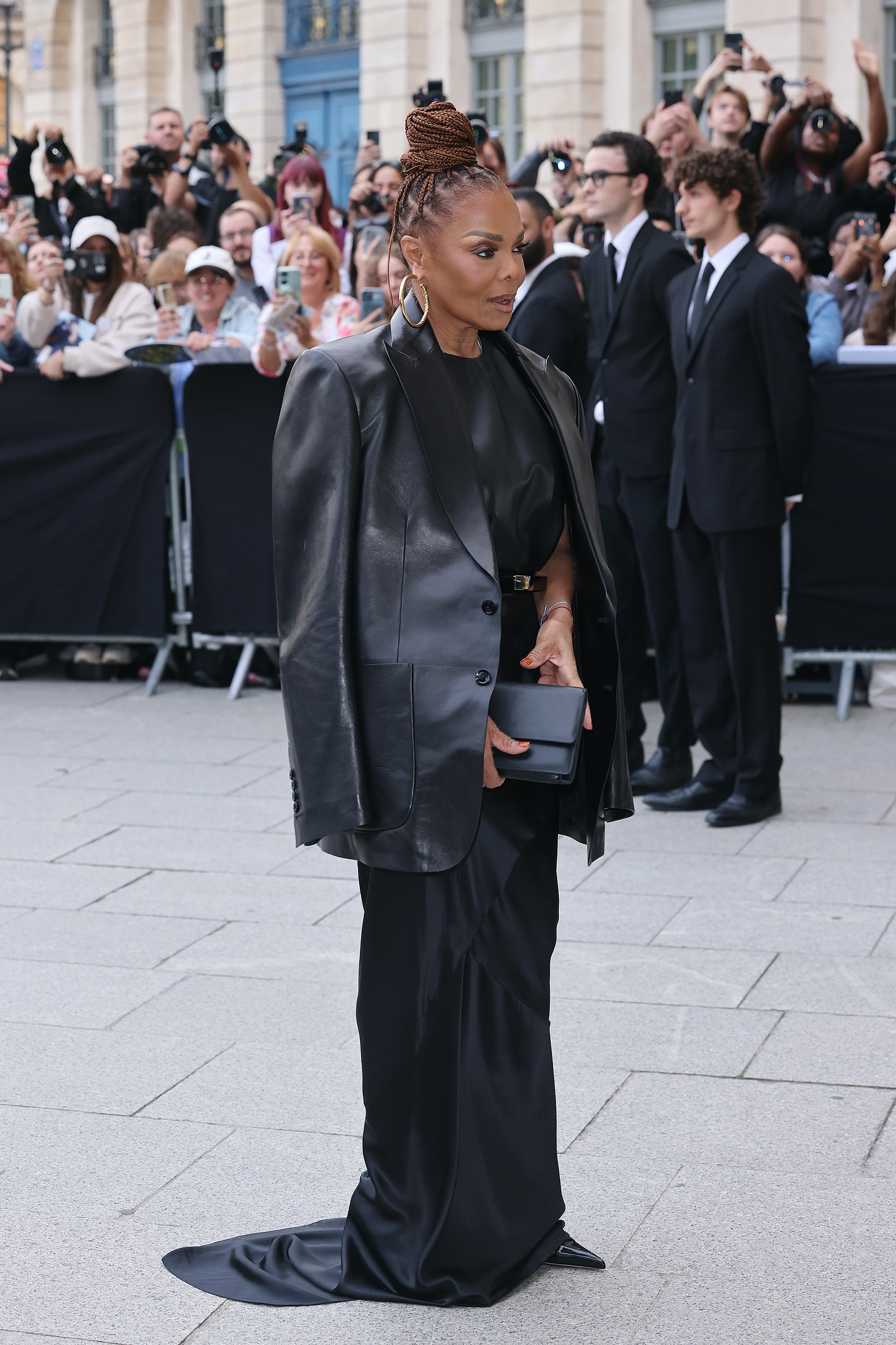 Janet Jackson wearing an braided updo hairstyle