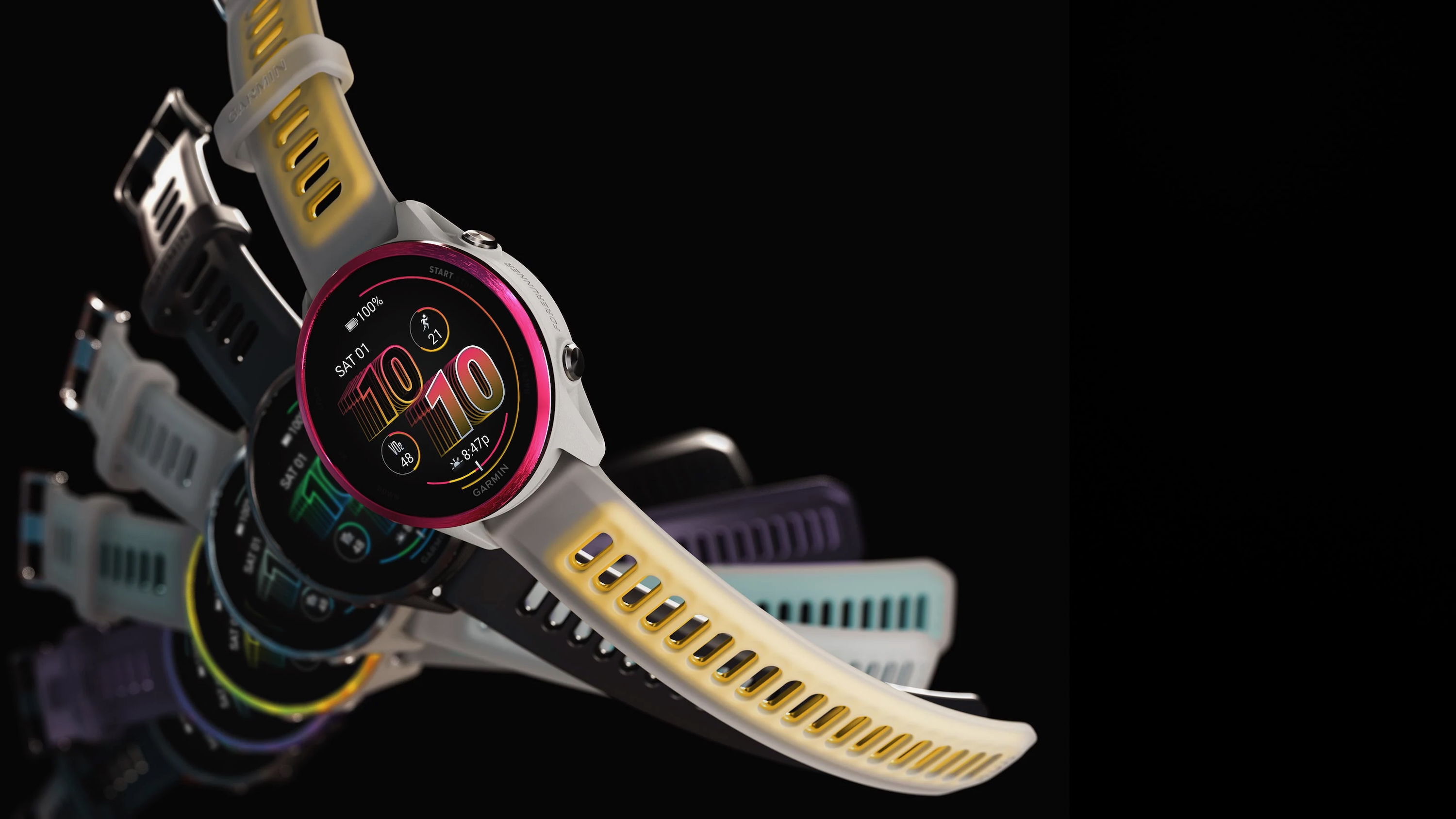 Several Garmin Forerunner 570 watches rendered in a black void, splayed along the left edge to create a slow-motion falling effect.