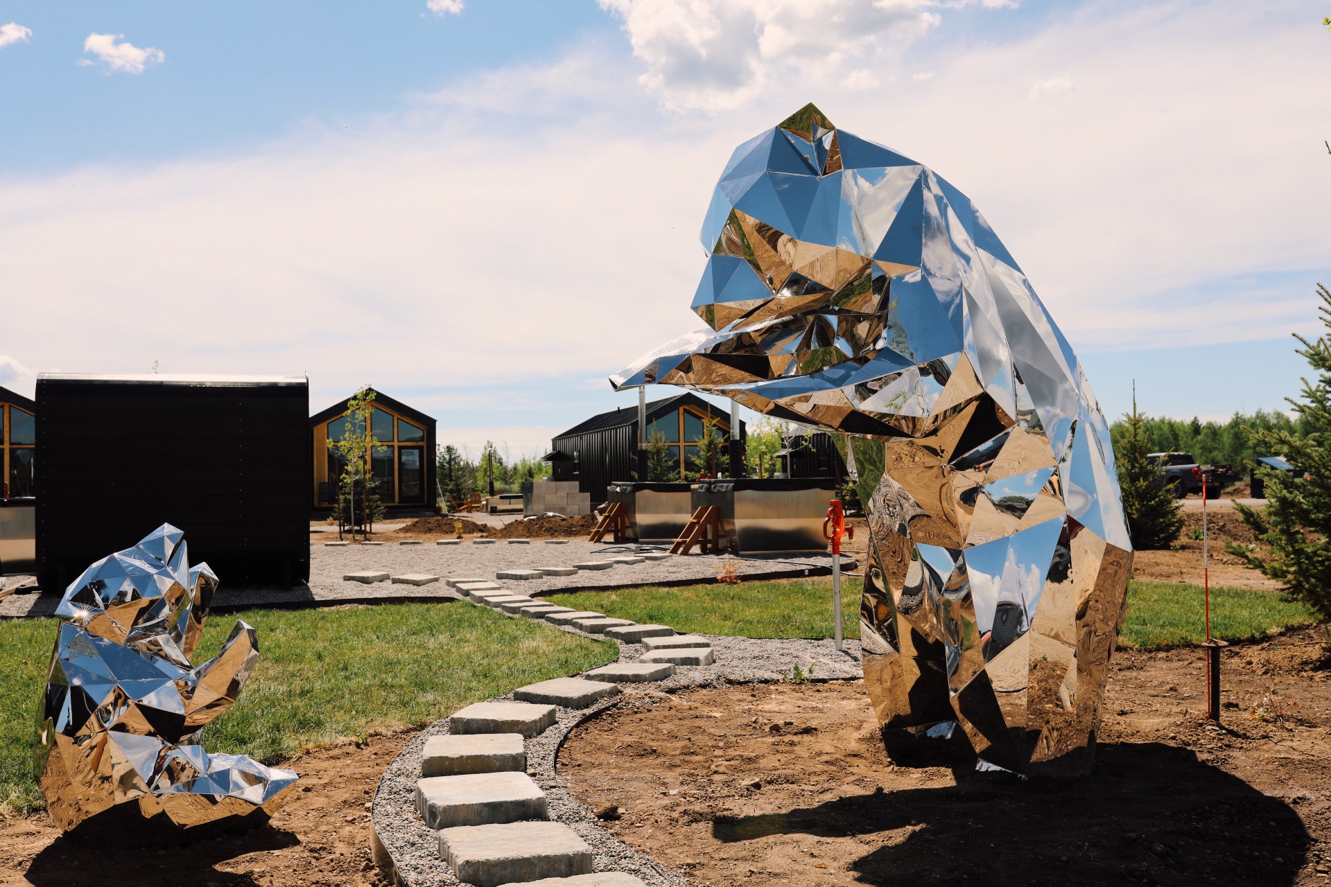 Two shiny bear statues on display at Yellowstone Peaks Hotel in Idaho