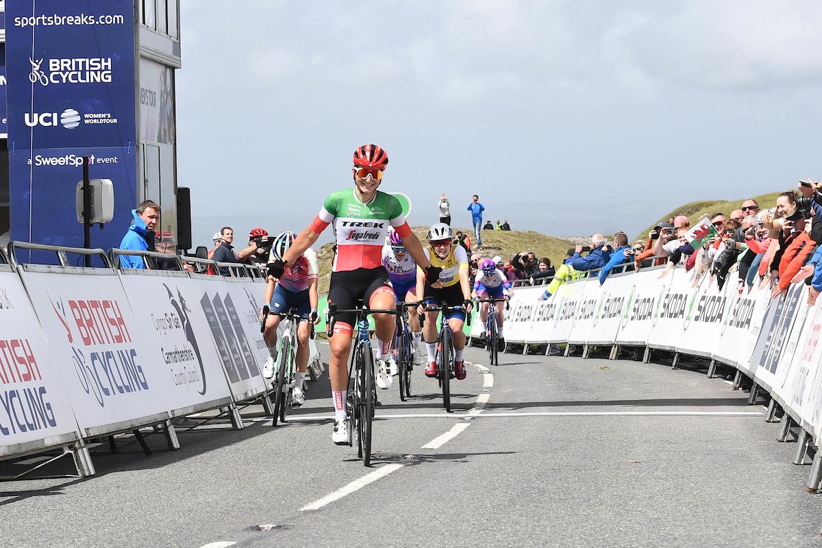 Picture by Simon Wilkinson/SWpix.com - 10/06/2022 - Cycling - The Women&acirc;s Tour 2022 - Stage Five - Pembrey Country Park to The Black Mountain, Wales - Elisa Longo Borghini of Team Trek Segafredo celebrating her victory with Katarzyna Niewiadoma of Team Canyon SRAM Racing in second and Grace Brown of Team FDJ Nouvelle Aquitaine Futuroscope in third