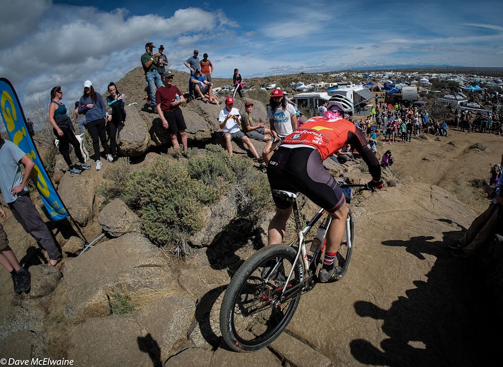 Ryan Fiege tackles a slickrock drop near the end of his first lap