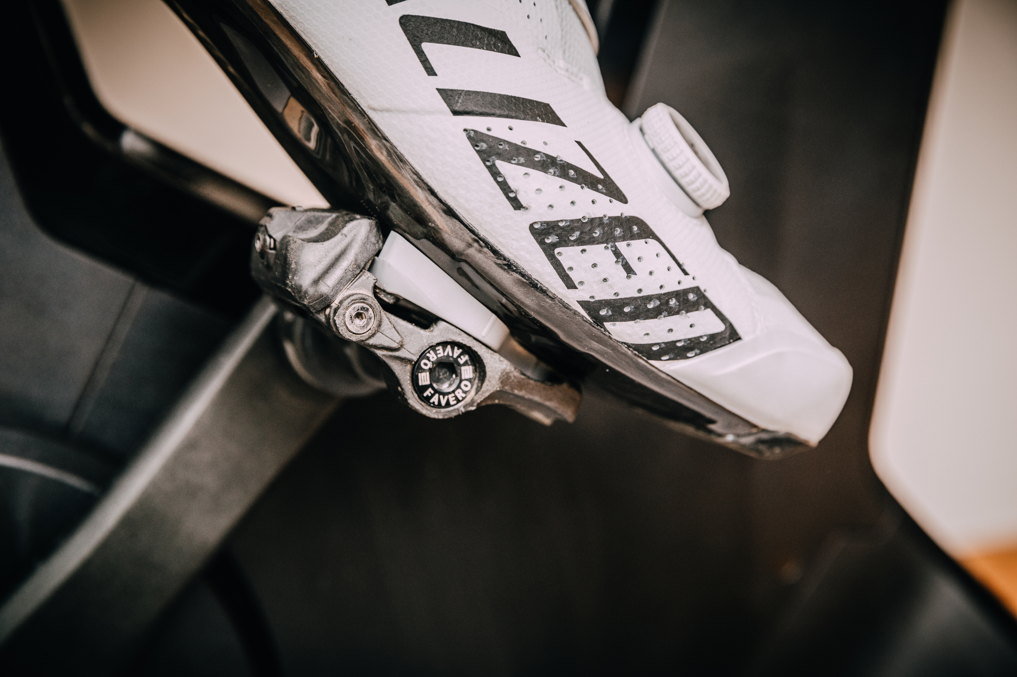 Image shows a rider clipped into power meter pedals.