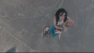 Fall characters at the top of a radio tower with a huge drop below