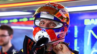 Max Verstappen of the Netherlands and Oracle Red Bull Racing prepares to sit in the car prior to F1 testing 2024 at Bahrain International Circuit. 