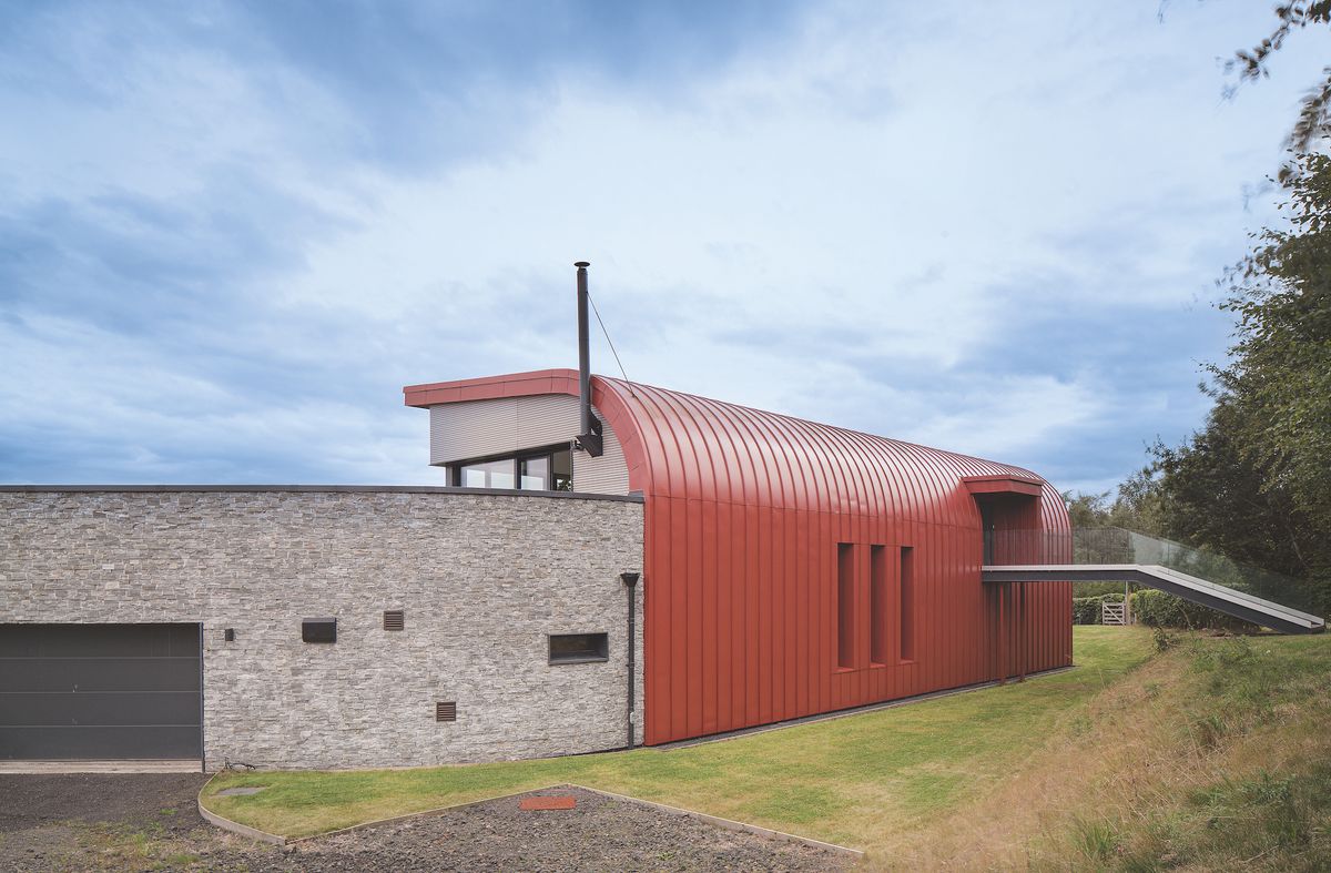 self build with garage and red roof