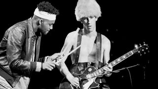 Hillel Slovak of Red Hot Chili Peppers with unknown drummer, 1985