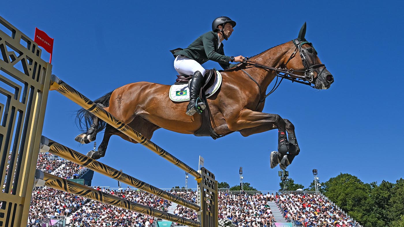 Yuri Mansur of Team Brazil, on Miss Blue, during the Jumping Individual Qualifier at the Ch&amp;acirc;teau de Versailles during the 2024 Paris Summer Olympic Games.
