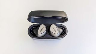 Jabra Connect 5T in charging case on a white background