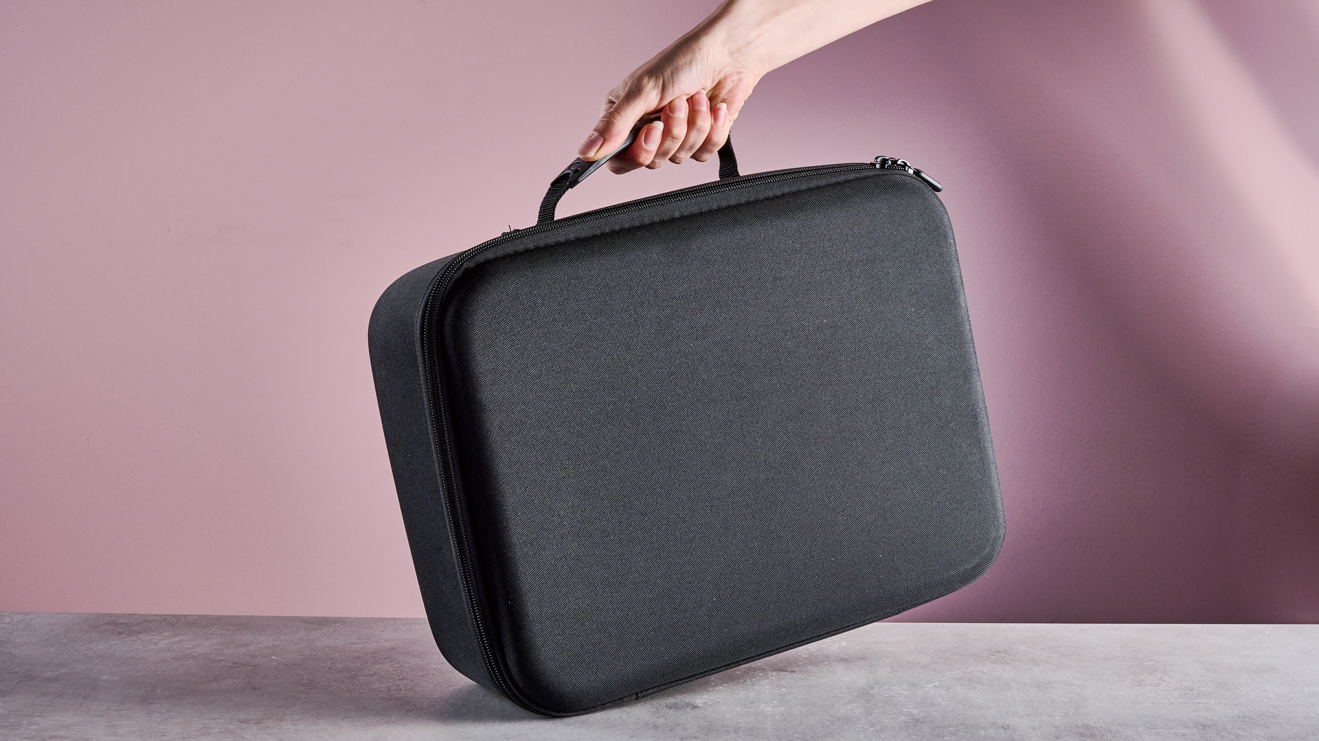 Woman holding the Nacon Storage Case for Nintendo Switch 2