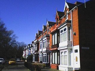 Low-res photo of row of houses