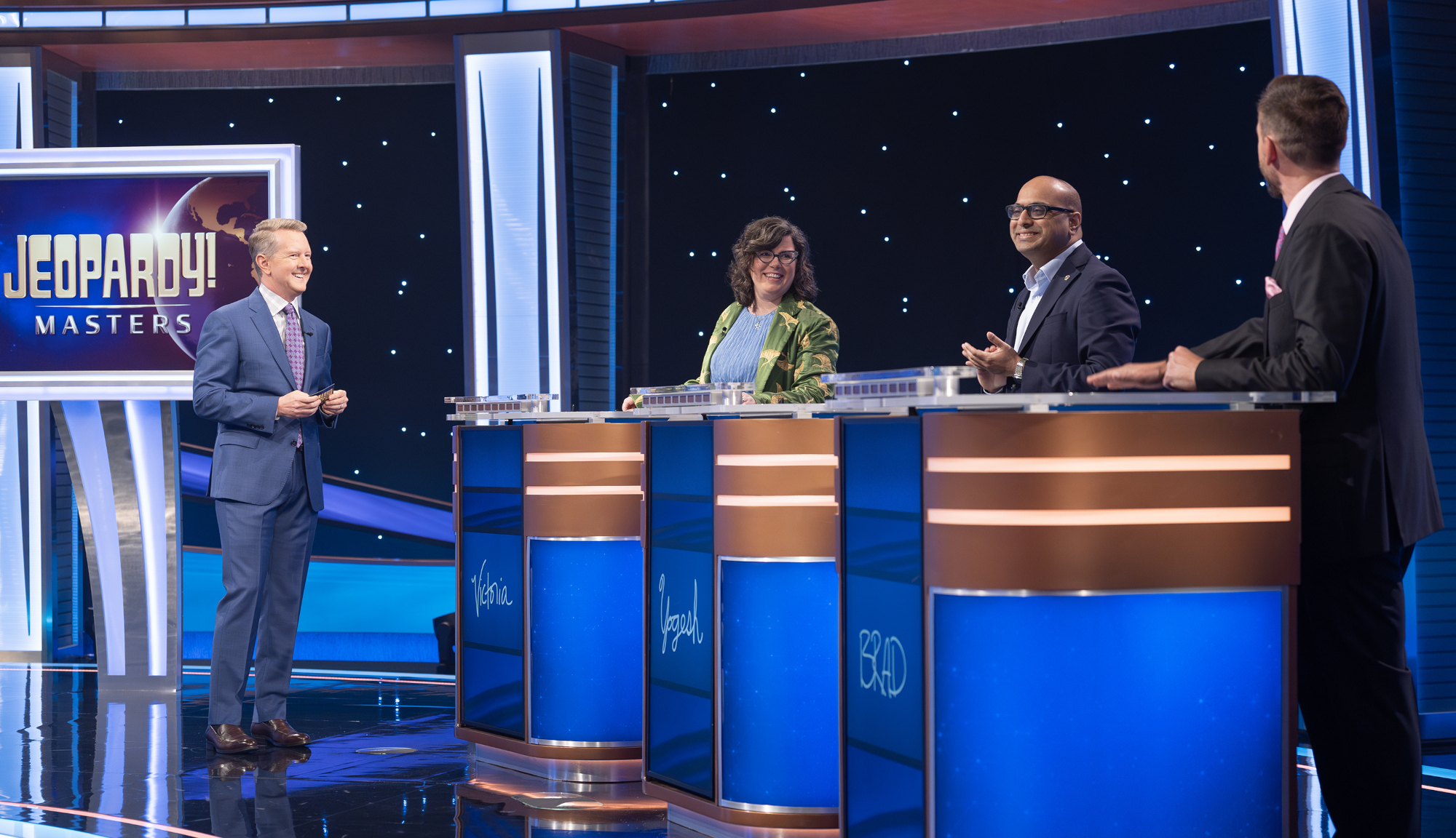 Ken Jennings talking with Victoria Groce, Yogesh Raut and Brad Rutter on Jeopardy! Masters