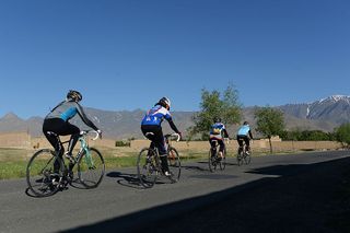 This photograph taken on June 9 2014 shows members of the Afghan national women's cycling team riding their road bikes in Paghman district of Kabul province 