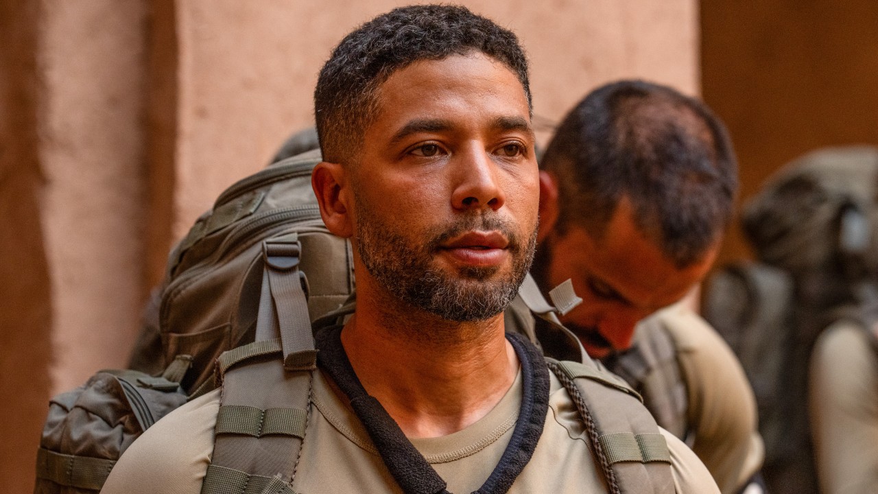 Jussie Smollett standing at attention.