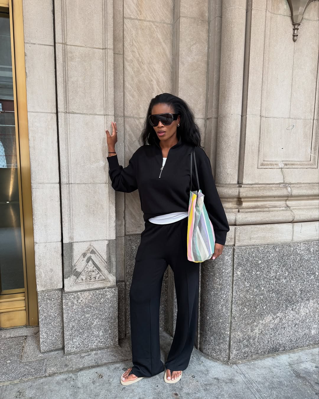 woman wearing fall sweatpant outfit 2025