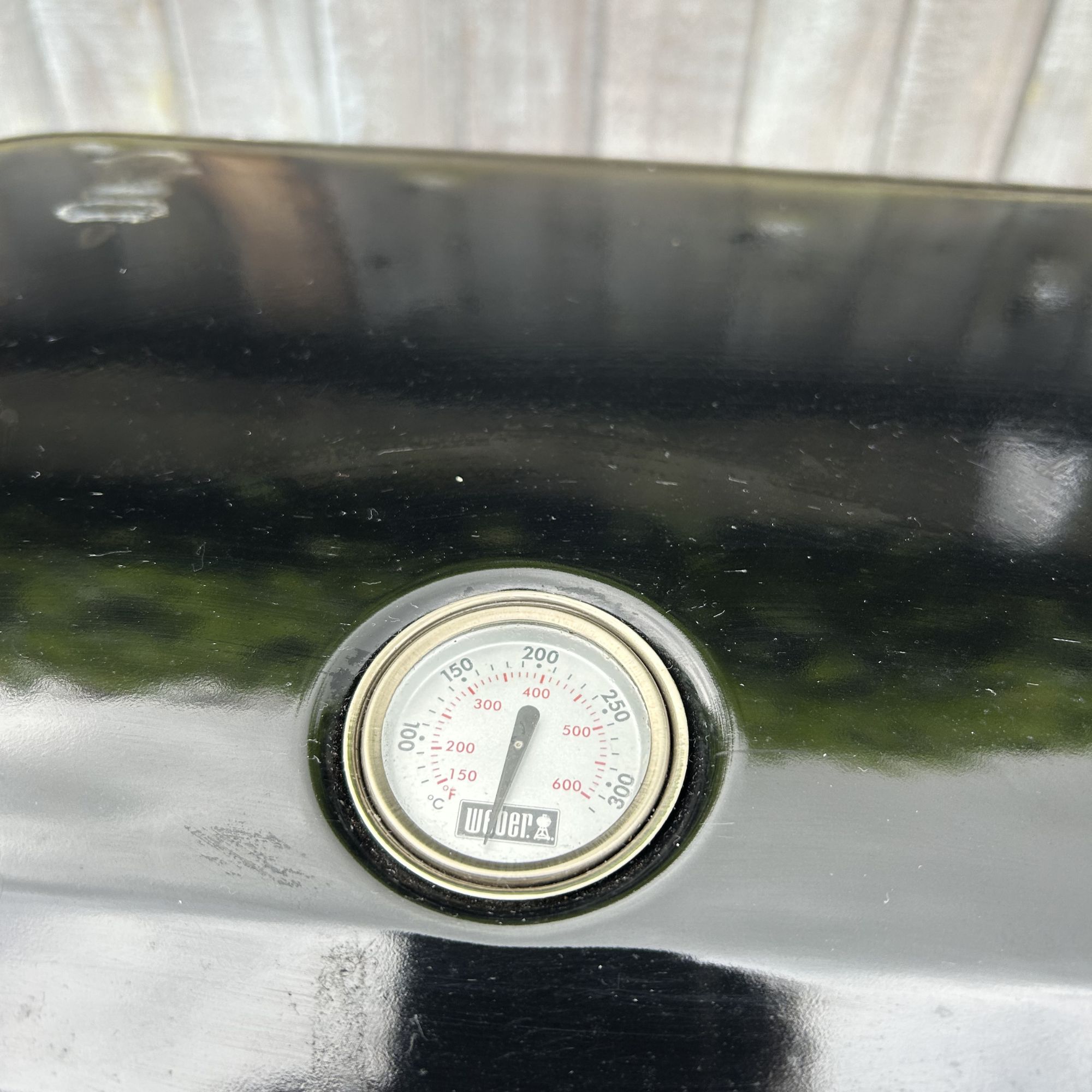 Weber BBQ thermometer on lid