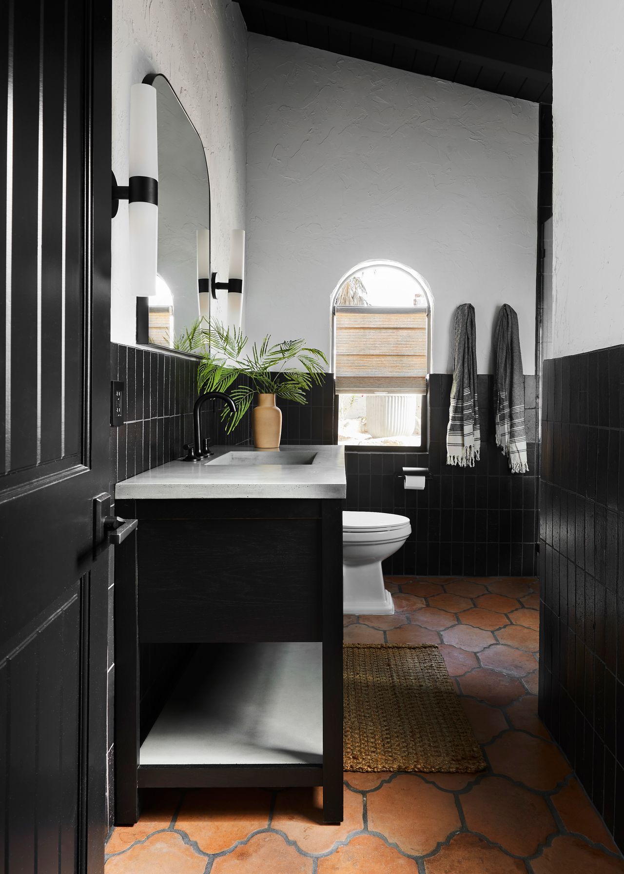 a dark rustic bathroom design