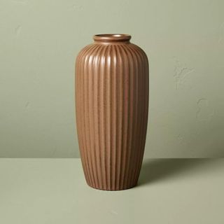 A ribbed ceramic vase 