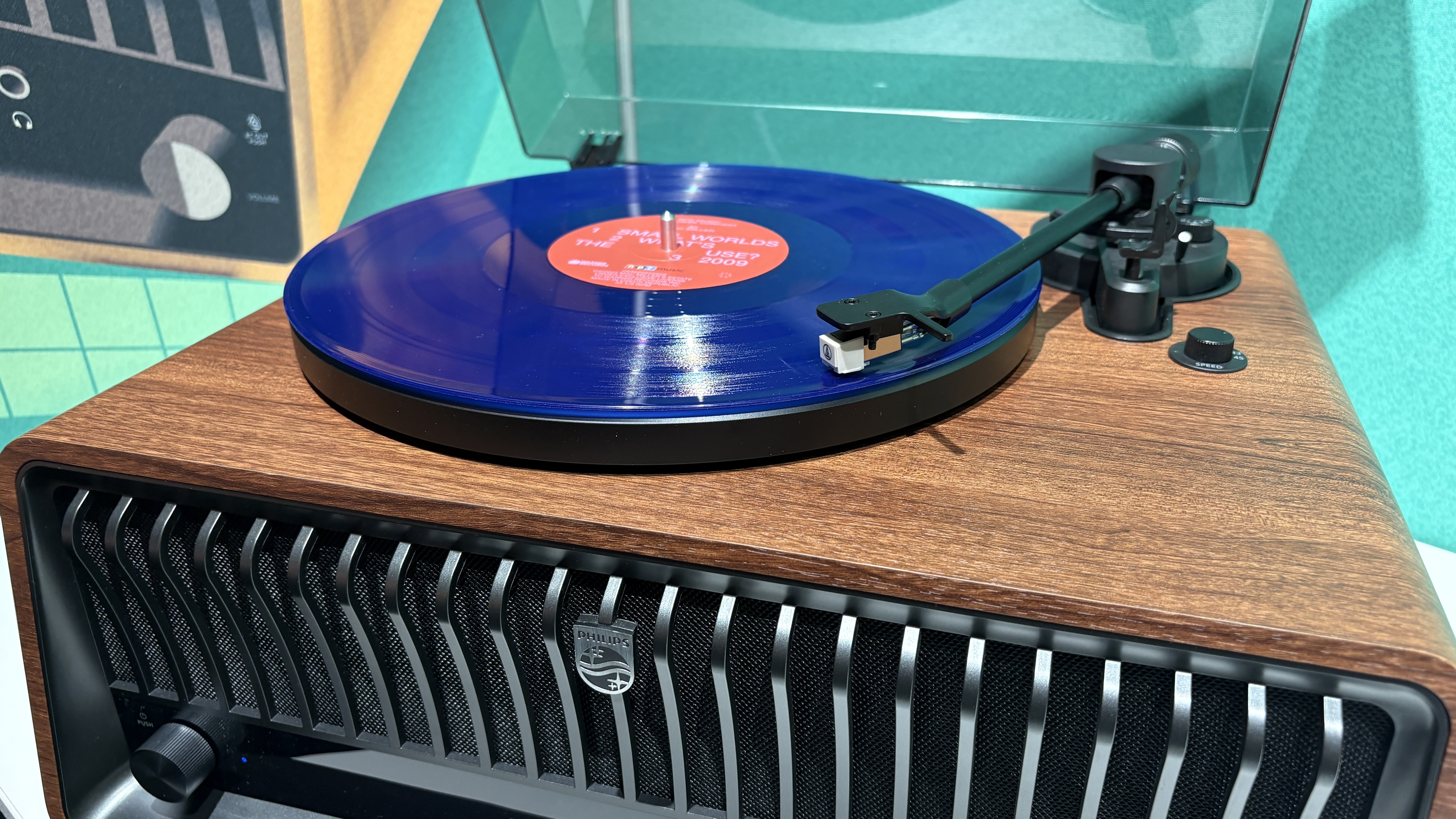 Philips The Tina turntable with blue vinyl record on display