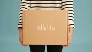 woman holding Little Lifts box