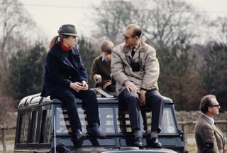 Prince Philip, the Duke of Edinburgh with his daughter, Princess Anne, circa 1980.