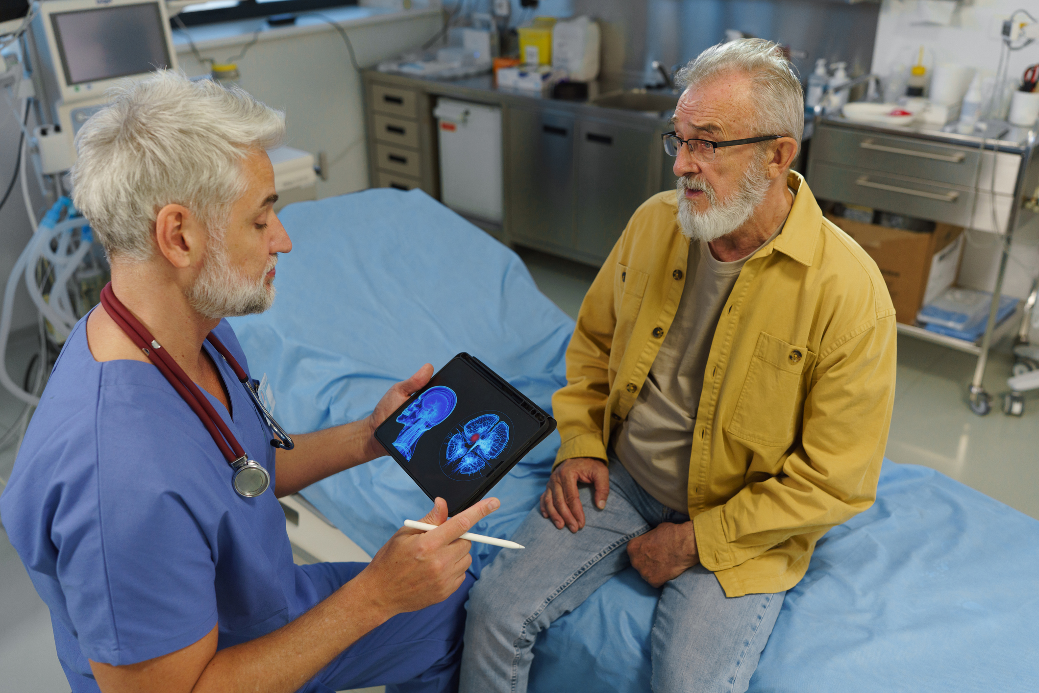 Doctor talking with senior patient