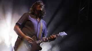 BRISTOL, ENGLAND - AUGUST 17: Kurt Ballou of Converge performs at ArcTanGent Festival 2023 at Fernhill Farm on August 17, 2023 in Bristol, England. (Photo by Aldara Zarraoa/Redferns)