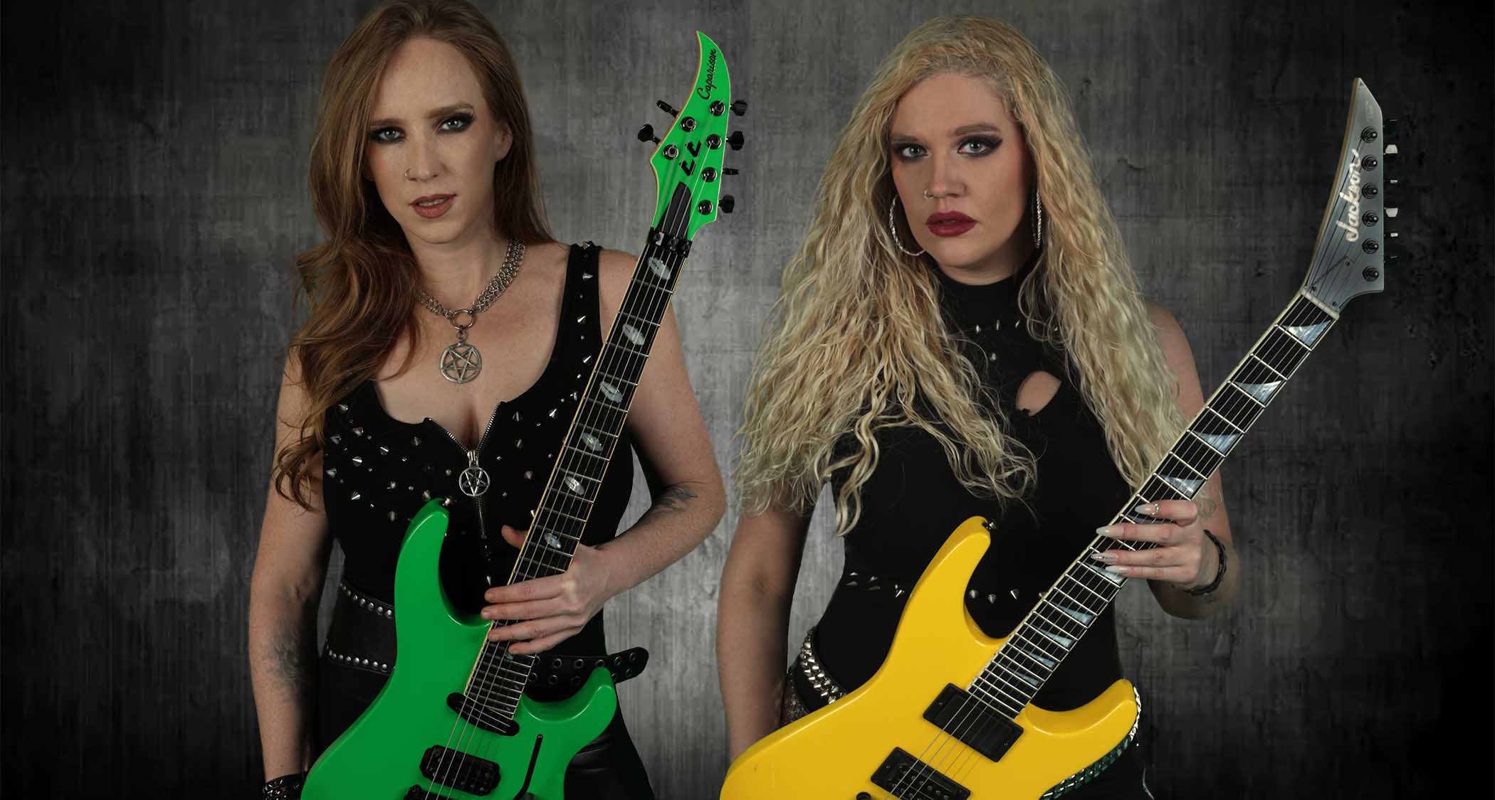 Courtney Cox and Romana Kalkuhl of Burning Witches. Cox holds her slime green Caparison, while Kalkuhl has a yellow Jackson Soloist.