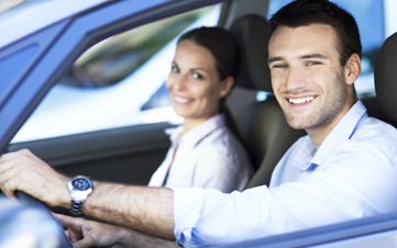 Man and woman driving