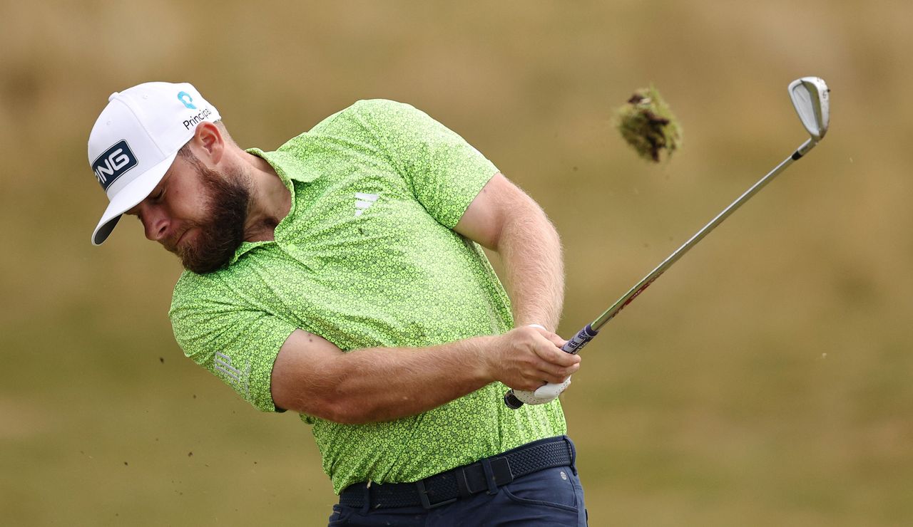 Tyrrell Hatton strikes his iron shot