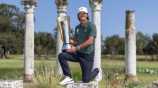 Taichi Kho holds the International Series Morocco trophy