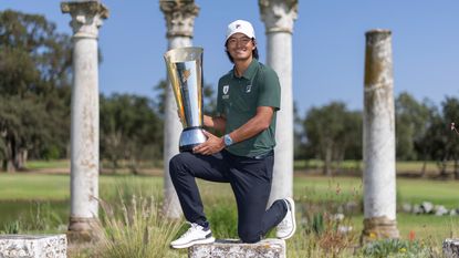 Taichi Kho holds the International Series Morocco trophy
