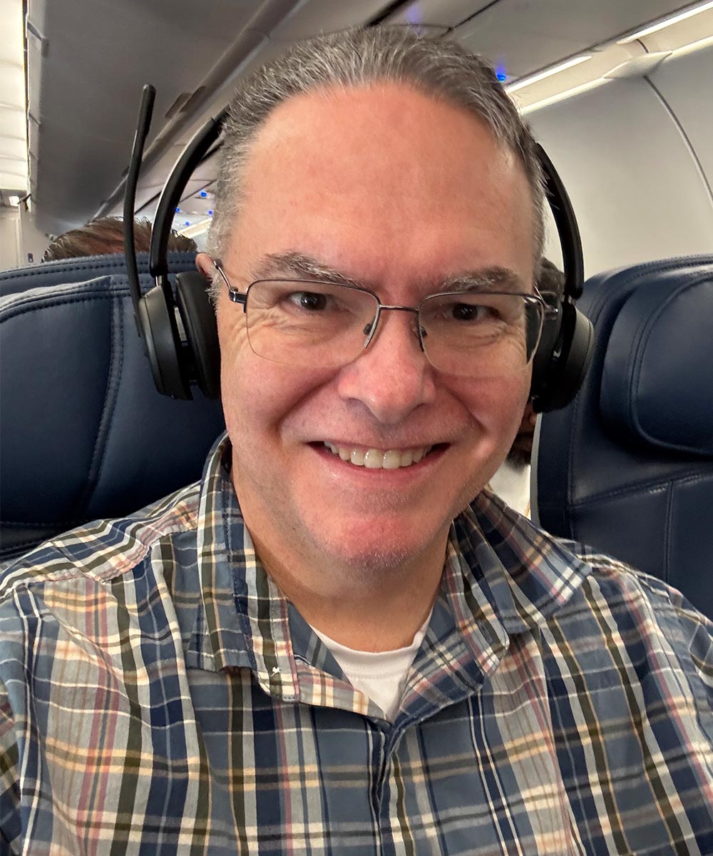 Mark J. Pescatore on plane testing headset